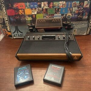 Vintage Atari Computer System Game with Asteroids, Circus Atari, and ET